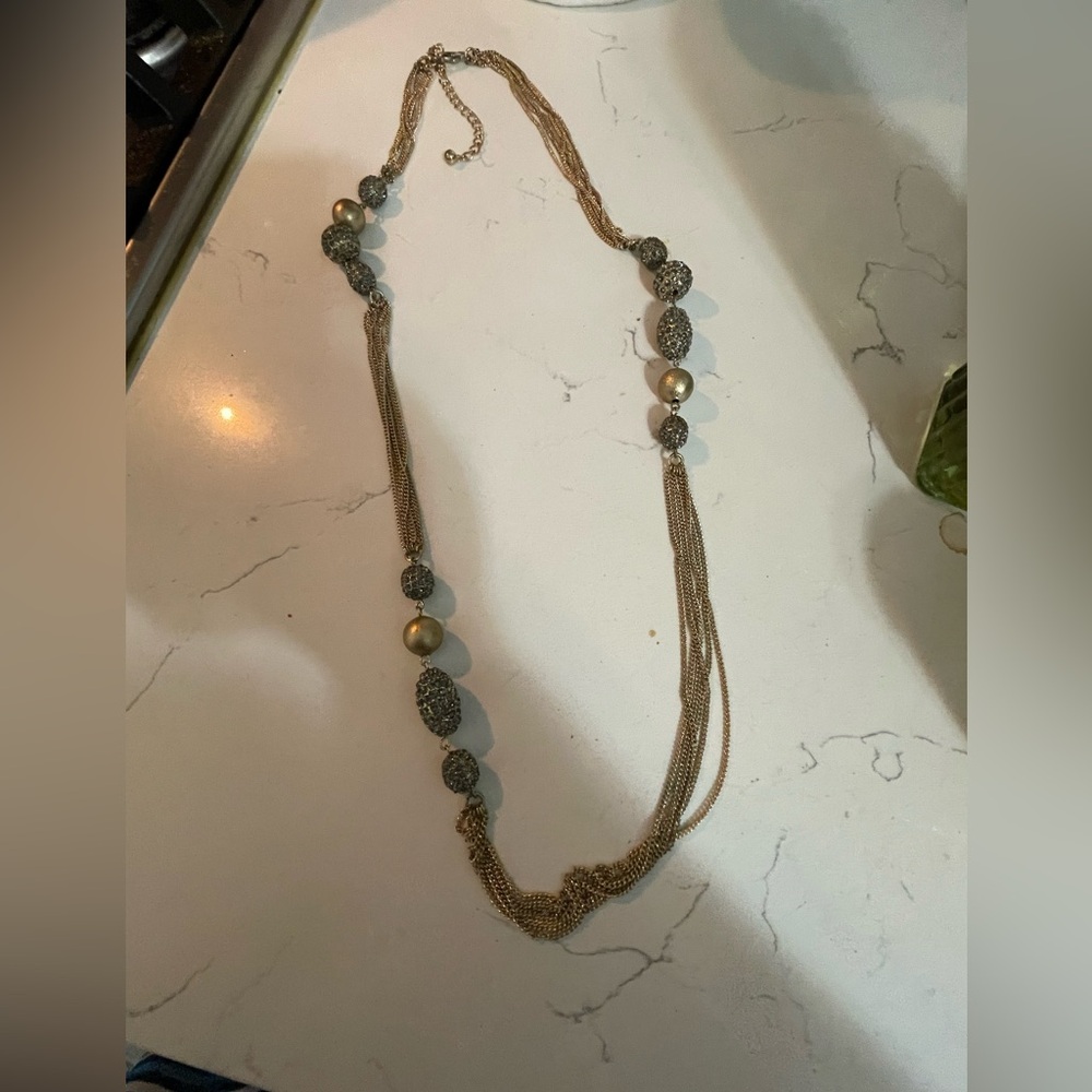 Chico’s Multi Strand Gold Necklace
With Rhinestone gems and gold globe
Accents